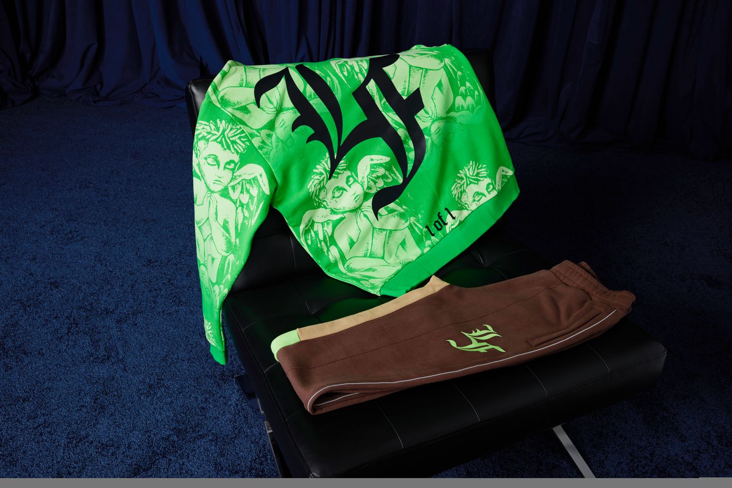 LaMelo Ball's green sweatshirt and brown pants.